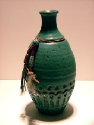 Green decorated bottle vase