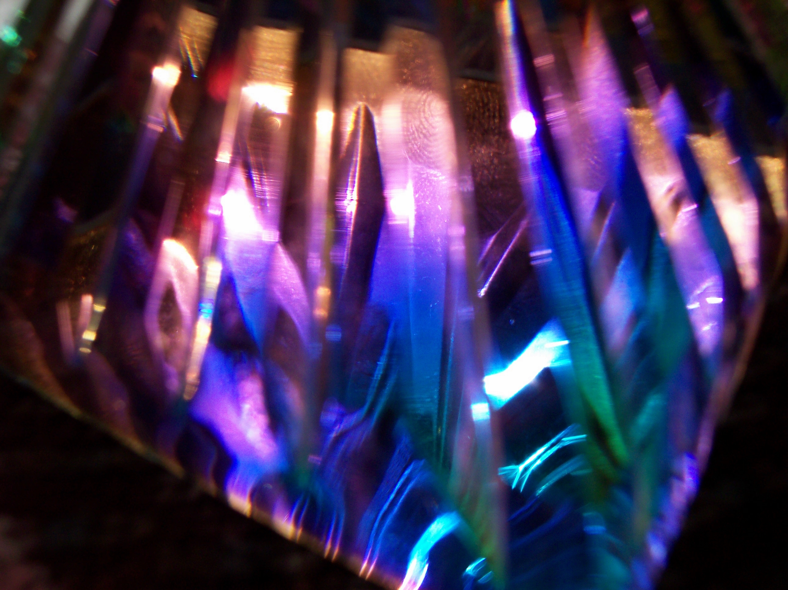 A semi blurred picture of multi colored crystals. 